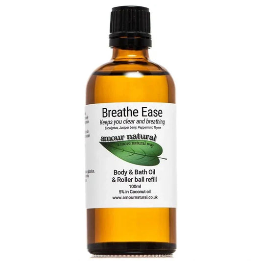 Breathe Ease Body & Bath Oil with essential oils in amber bottle.
