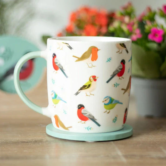 British Garden Birds ceramic mug with illustrations of Blue Tits, Robins, Goldfinches, and Bullfinches.