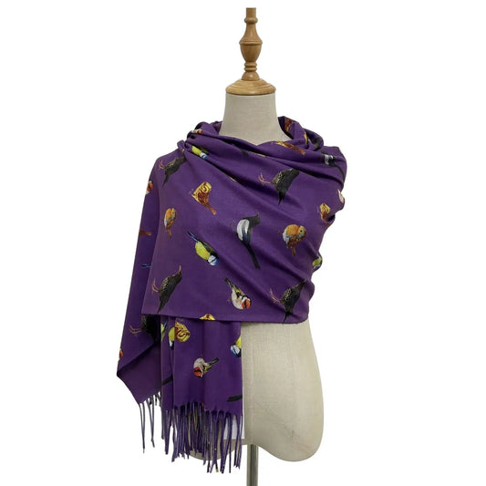 British Wildlife Birds tassel scarf with colorful bird print on a mannequin.