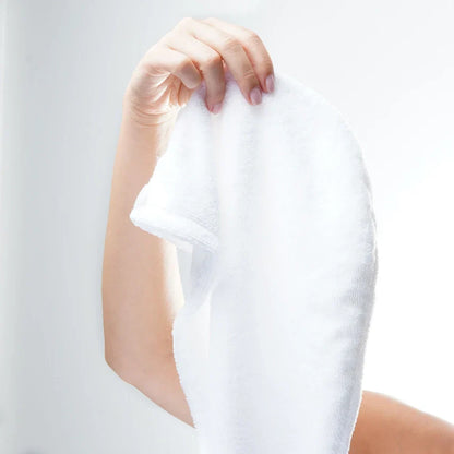 Microfibre hair towel with ultra-absorbent material and button fastener for minimizing frizz.