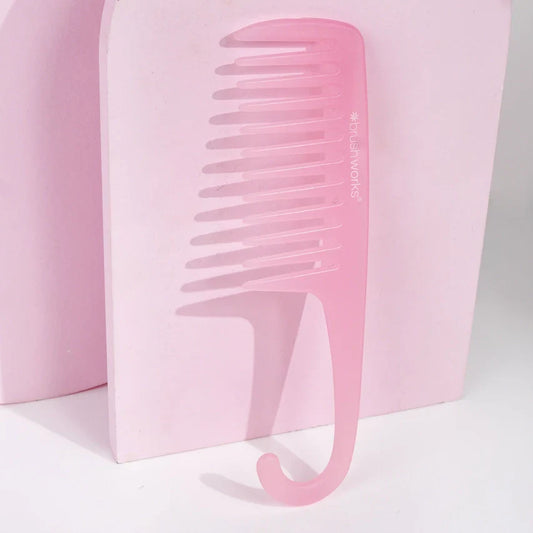Pretty Pink Shower Hair Comb with wide teeth and curved handle for easy hanging.