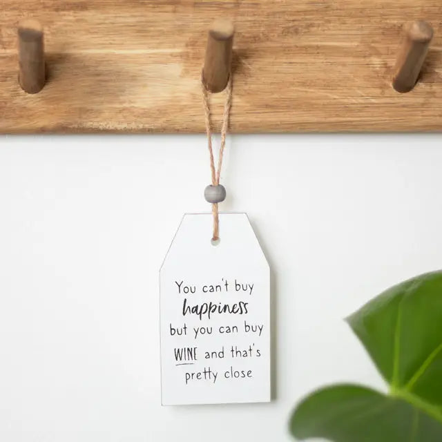 Can't Buy Happiness Wine hanging sentiment sign with humorous quote for special occasions.