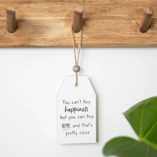 Can't Buy Happiness Wine hanging sentiment sign with humorous quote for special occasions.