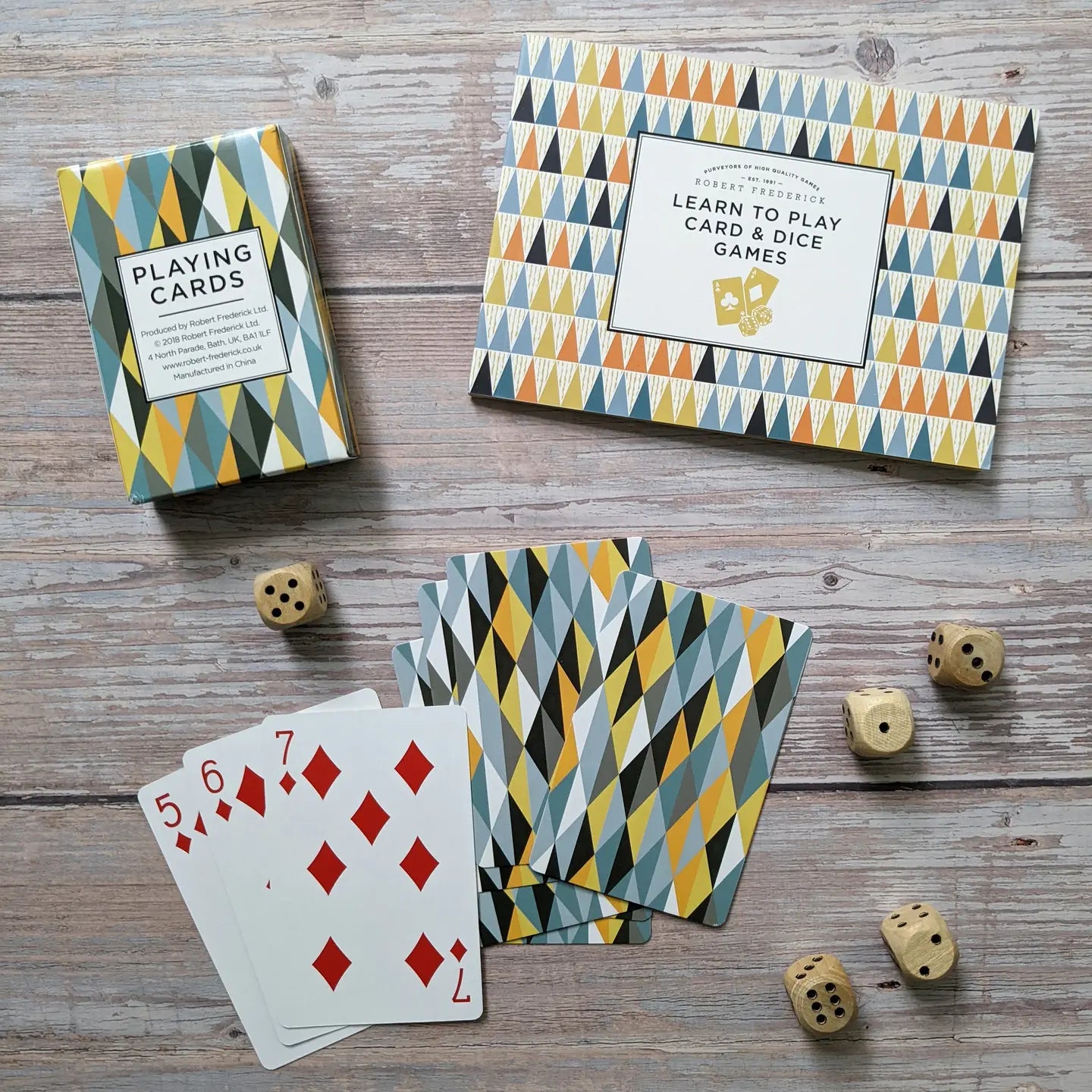 Card & Dice Set in stylish box with playing cards and wooden dice.