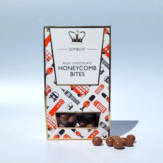 Chocolate Honeycomb Bites in colorful packaging with a view of chocolate-coated pieces.