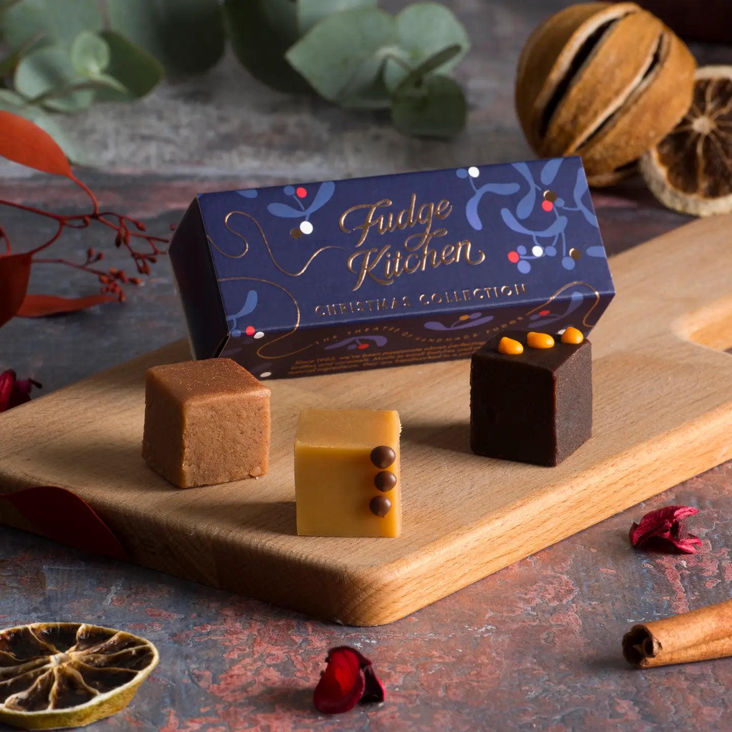 Christmas Fudge Trio Slider gift box featuring three squares of handmade gourmet fudge in Chocolate Orange, Speculoos, and Sea Salted Caramel flavours.
