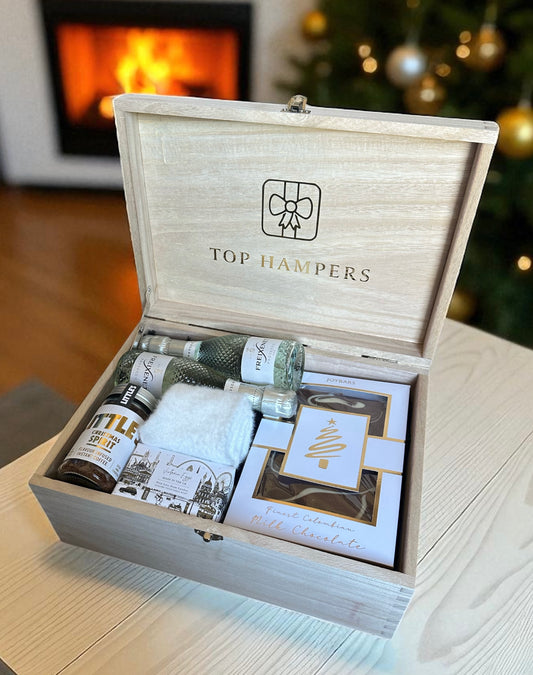 Christmas Treats wooden gift box with festive coffee, mini Freixenet sparkling wines, cosy socks, English soap, and Christmas chocolate slab.