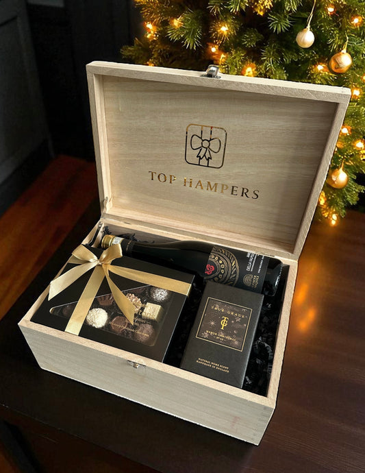 Christmas wine and chocolate gift box with Amarone red wine, assorted luxury chocolates, and True Grace Manor Christmas room spray.