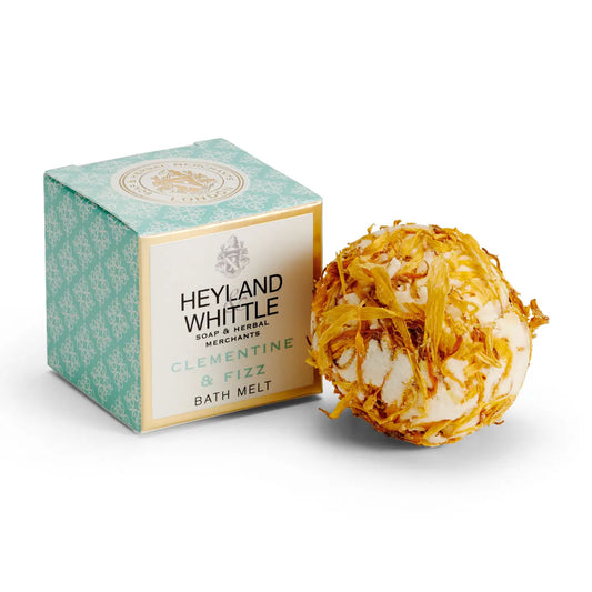 Clementine & Fizz Bath Melt with shea and cocoa butter, zesty scent, vegan-friendly.