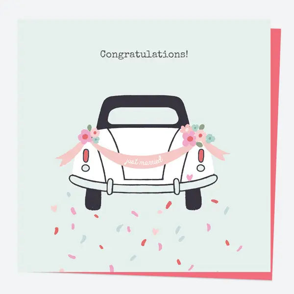 A sweet wedding card with a floral car and “Just Married” banner—perfect for sending love.