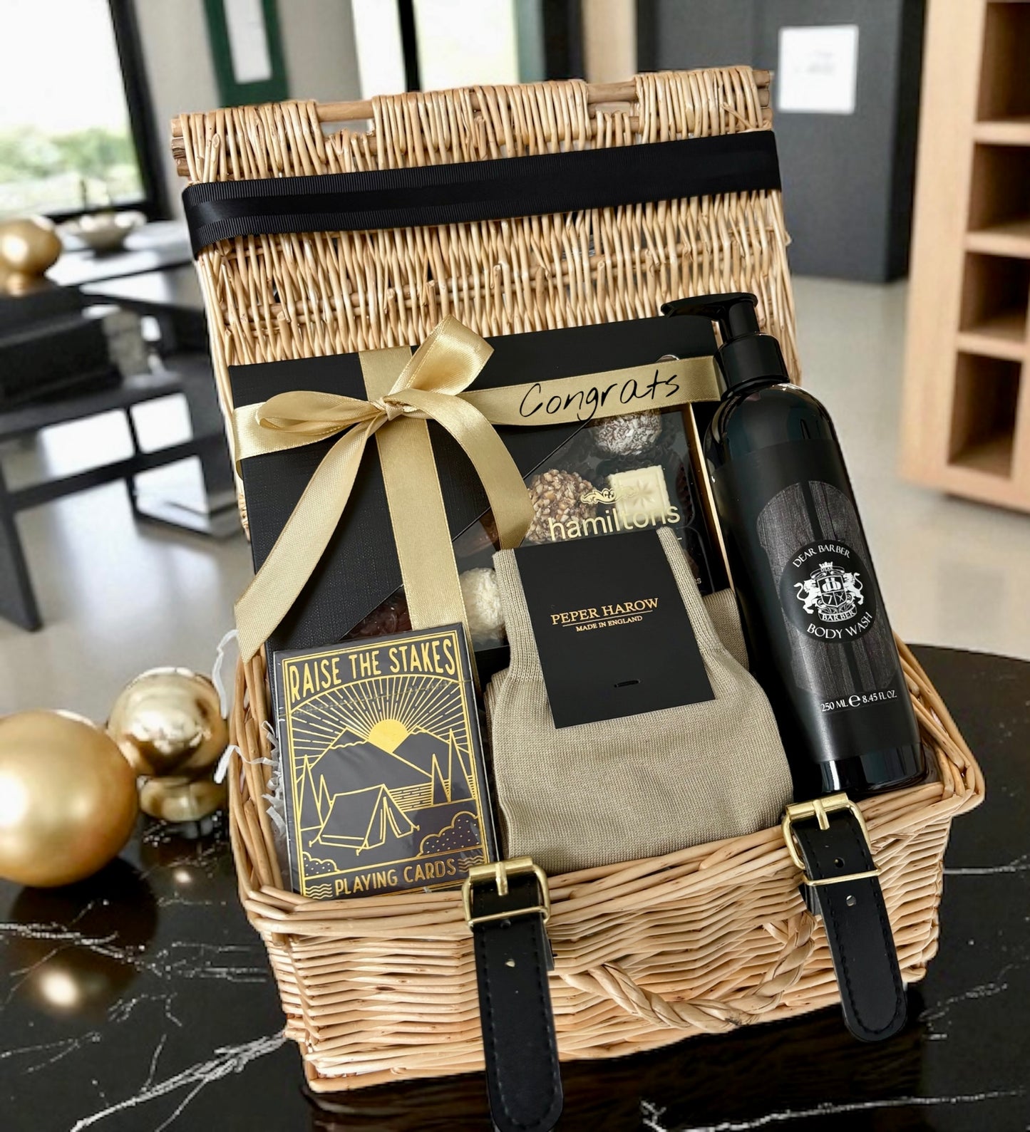 Socks, chocolates, body wash & cards — a refined gift to honour and celebrate his success.
