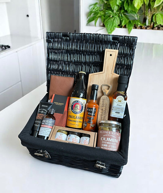 A premium Dad's Goodie's hamper of gourmet treats and essentials designed for Dad’s comfort and enjoyment.