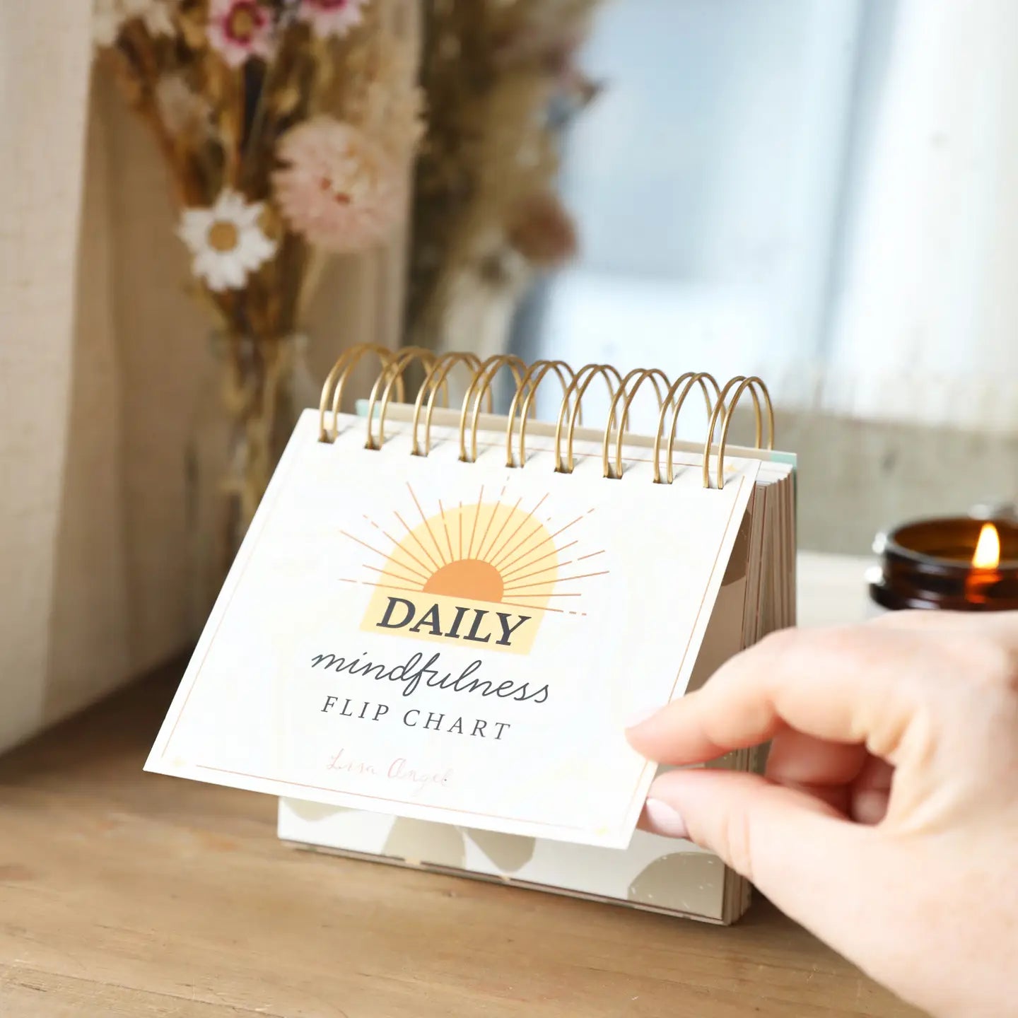 Daily Mindfulness Flip Chart with neutral patterned pages in a cozy setting.