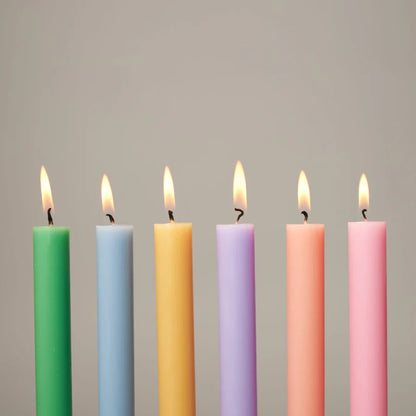 Set of 12 pastel candles, 6 colours. Long-lasting, drip-minimising, and solid through-colour.

