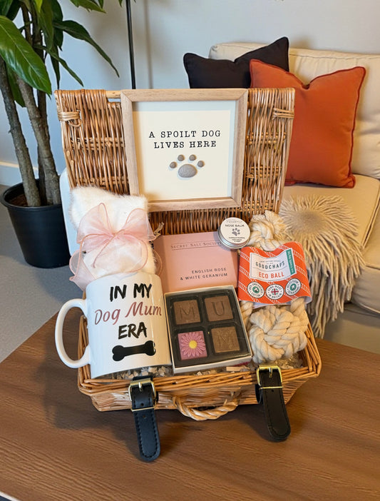 Gift basket with dog mum mug, MUM chocolates, bath salts, socks, dog toy, dog sign and nose balm.