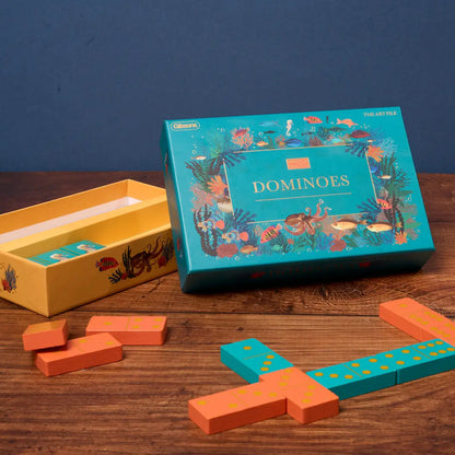 The Art File dominoes set with teal and terracotta tiles featuring sea creature illustrations.