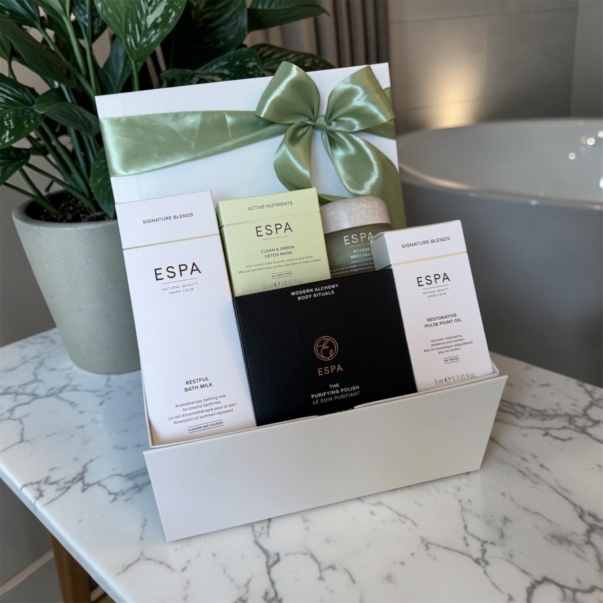 Luxury spa gift hamper with ESPA bath milk, body polish, detox mask, pulse point oil and bath salts.
