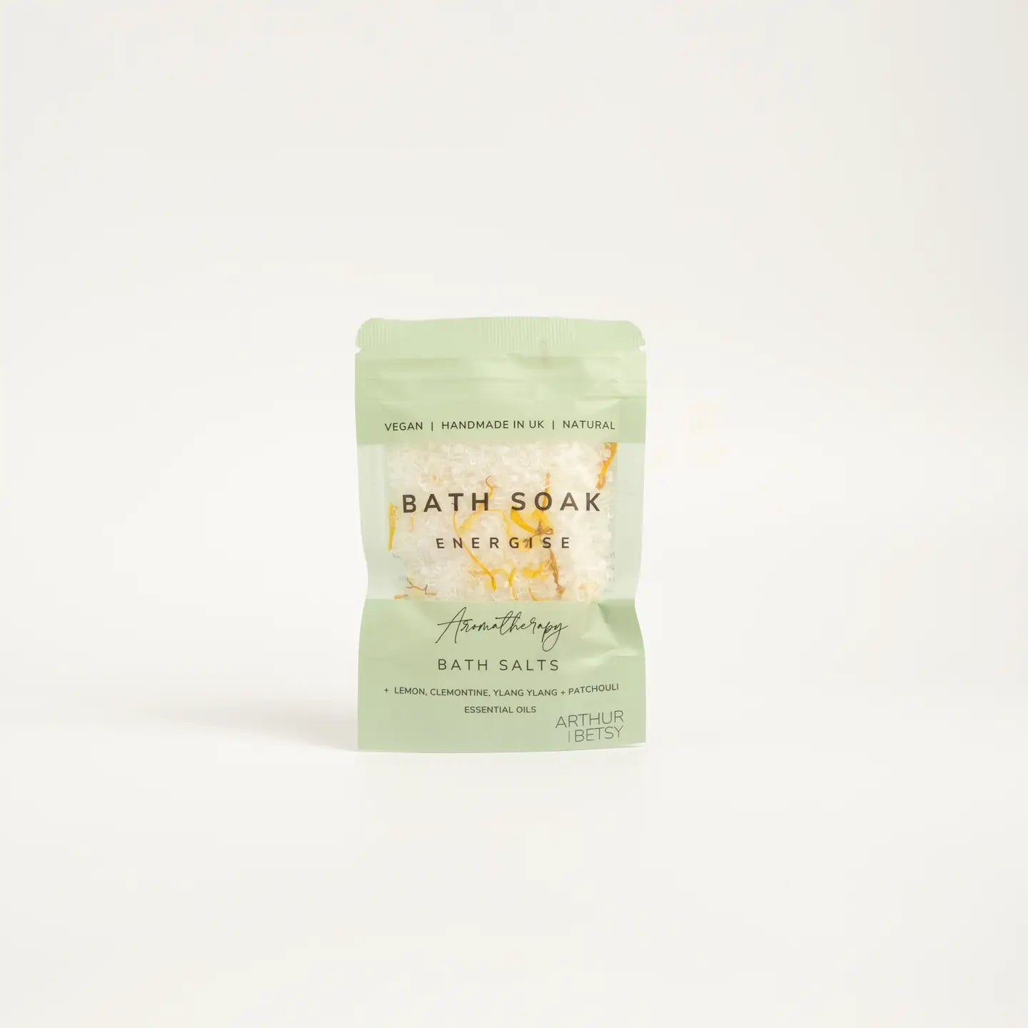 Pouch of handmade herbal bath salts blended with Epsom, Dead Sea, and Himalayan salts, dried flowers, and essential oils for relaxation and wellness.