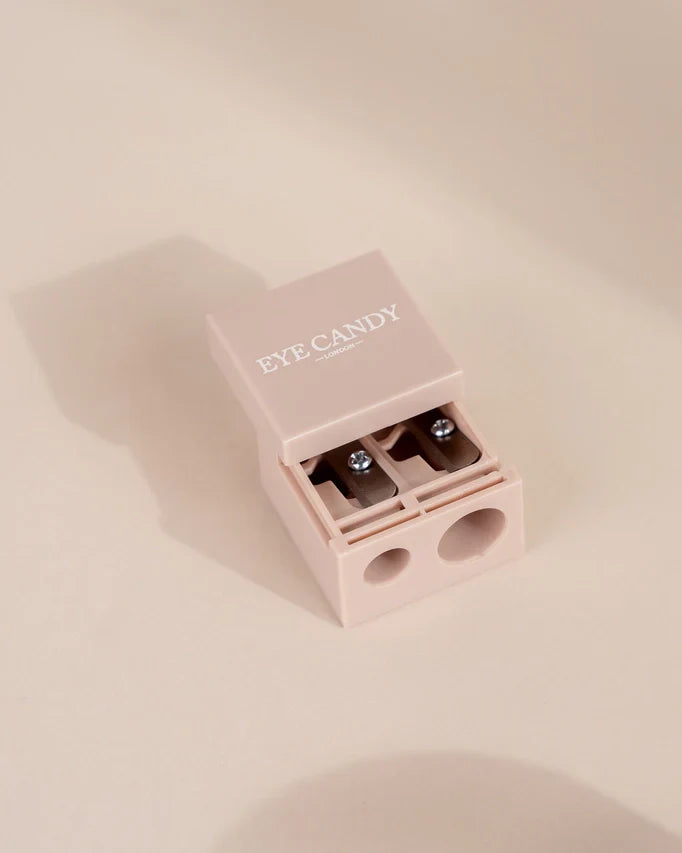 Eye Candy Duo Pink Pencil Sharpener with dual sharpening holes for regular and jumbo pencils.
