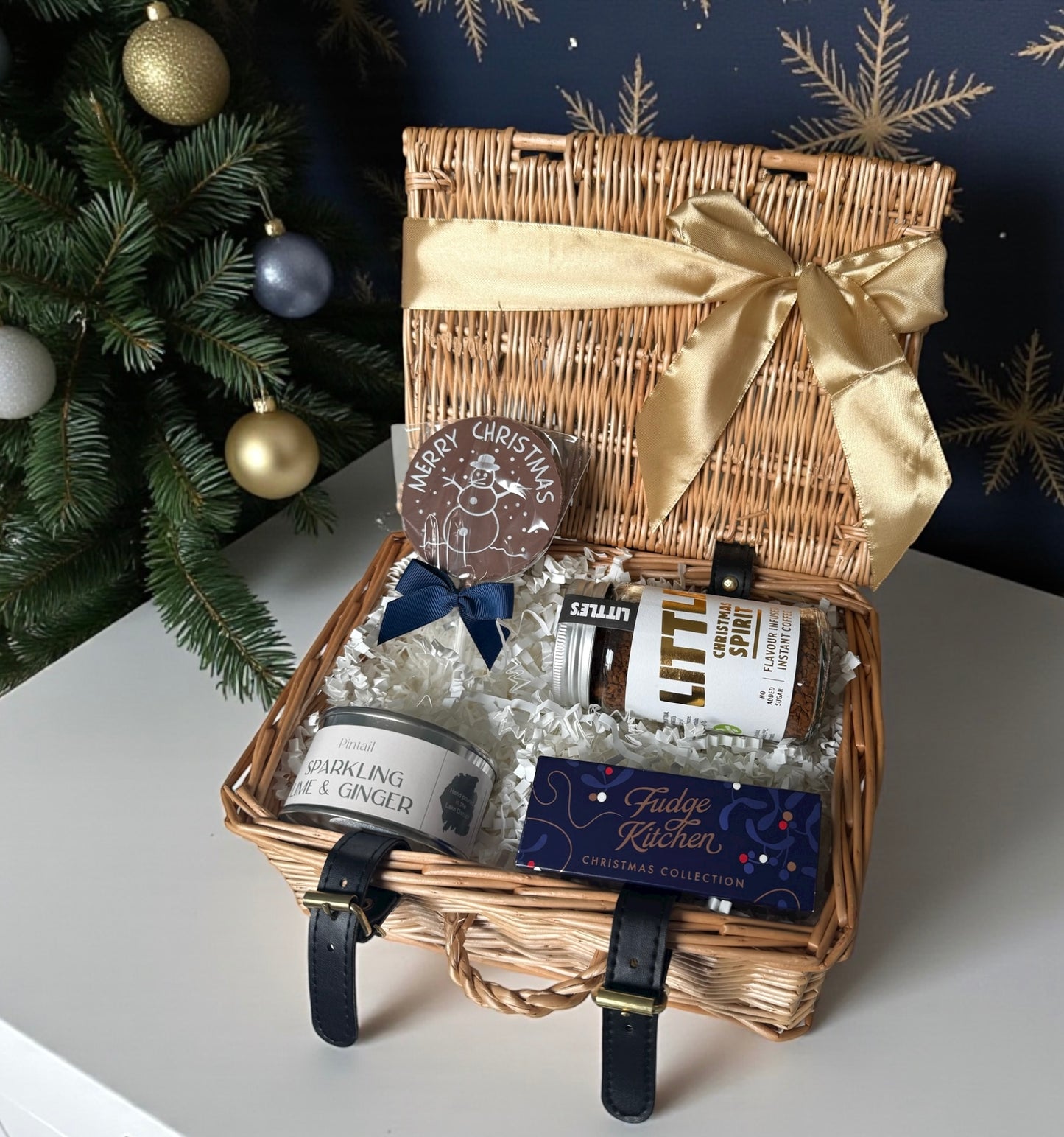 Festive gift with Christmas coffee, lime & ginger candle, Fudge Kitchen chocolates and a “Merry Christmas” chocolate lollipop.