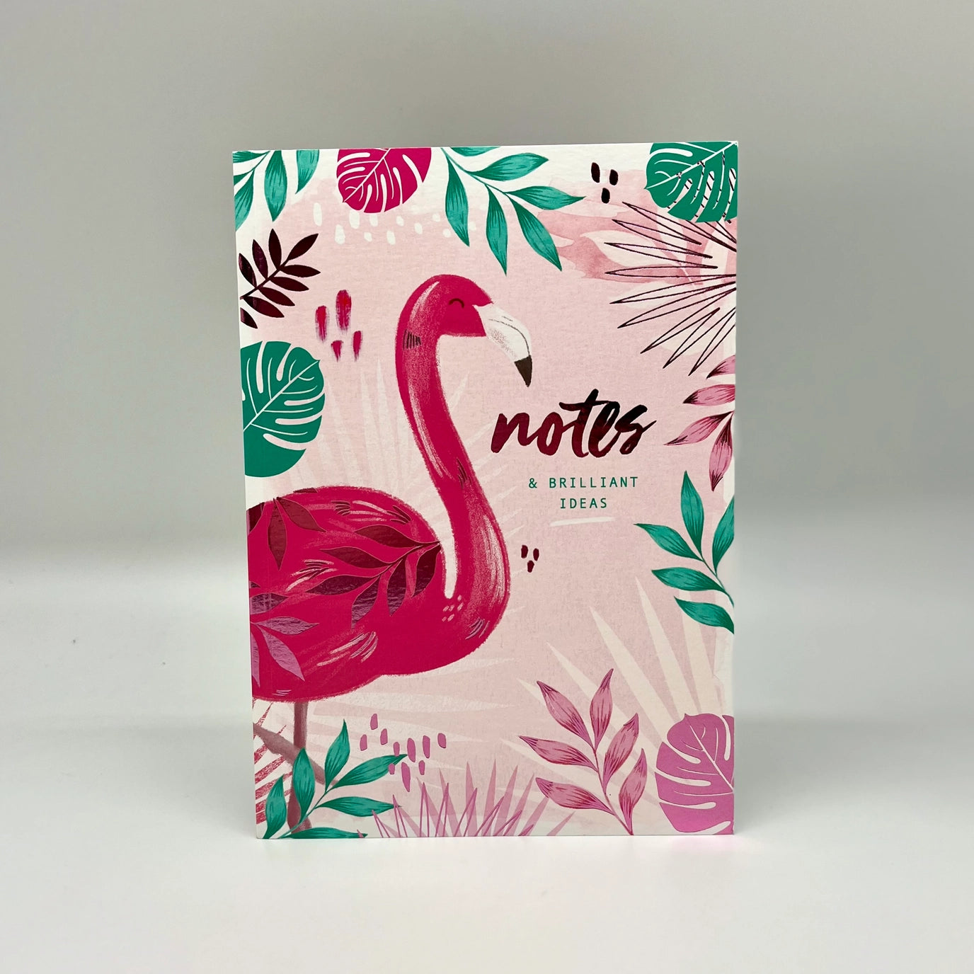 A5 soft-cover lined notebook featuring a bright tropical leaf and flamingo design.