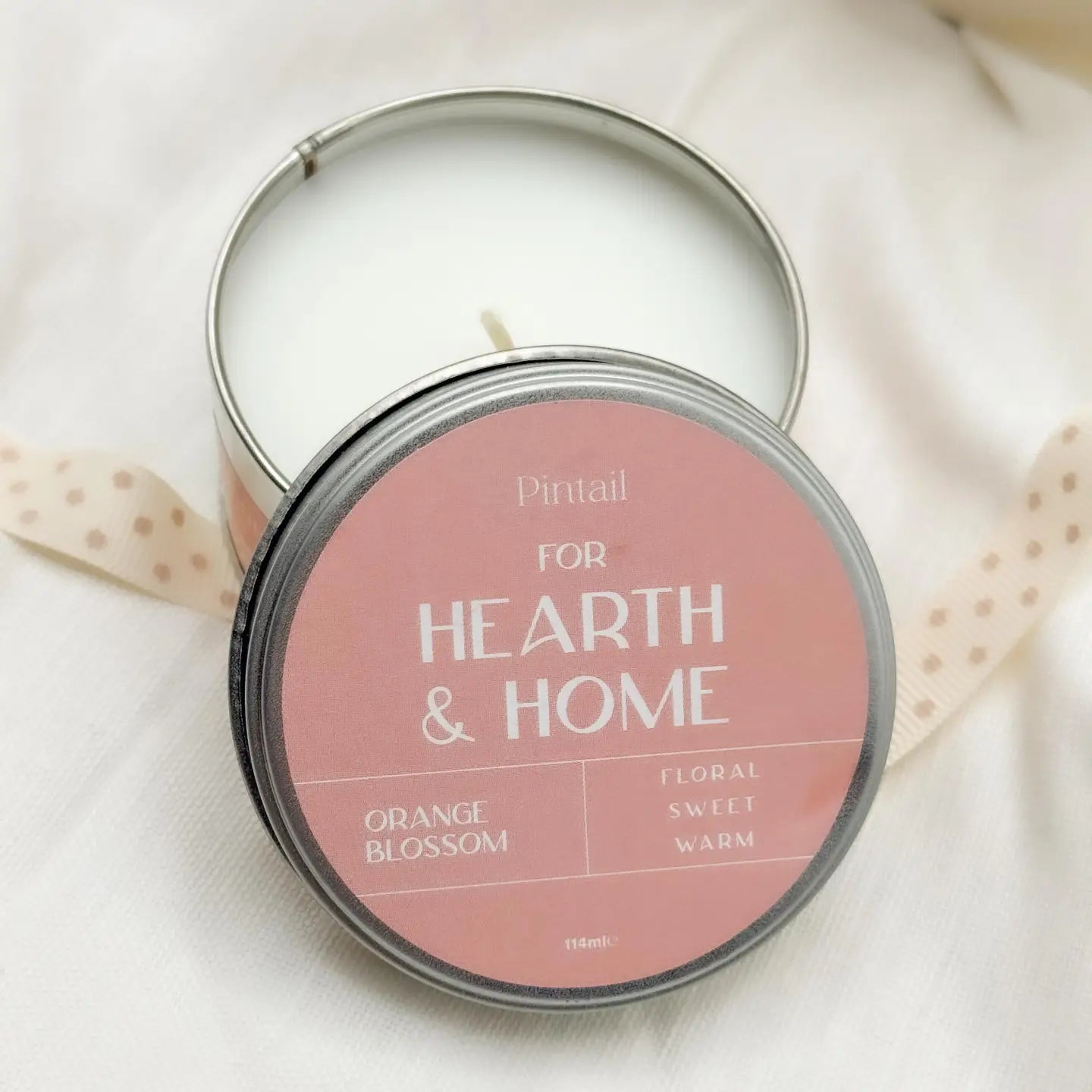 Hearth and Home Candles in Orange Blossom scent with lid, hand-poured vegetable wax.