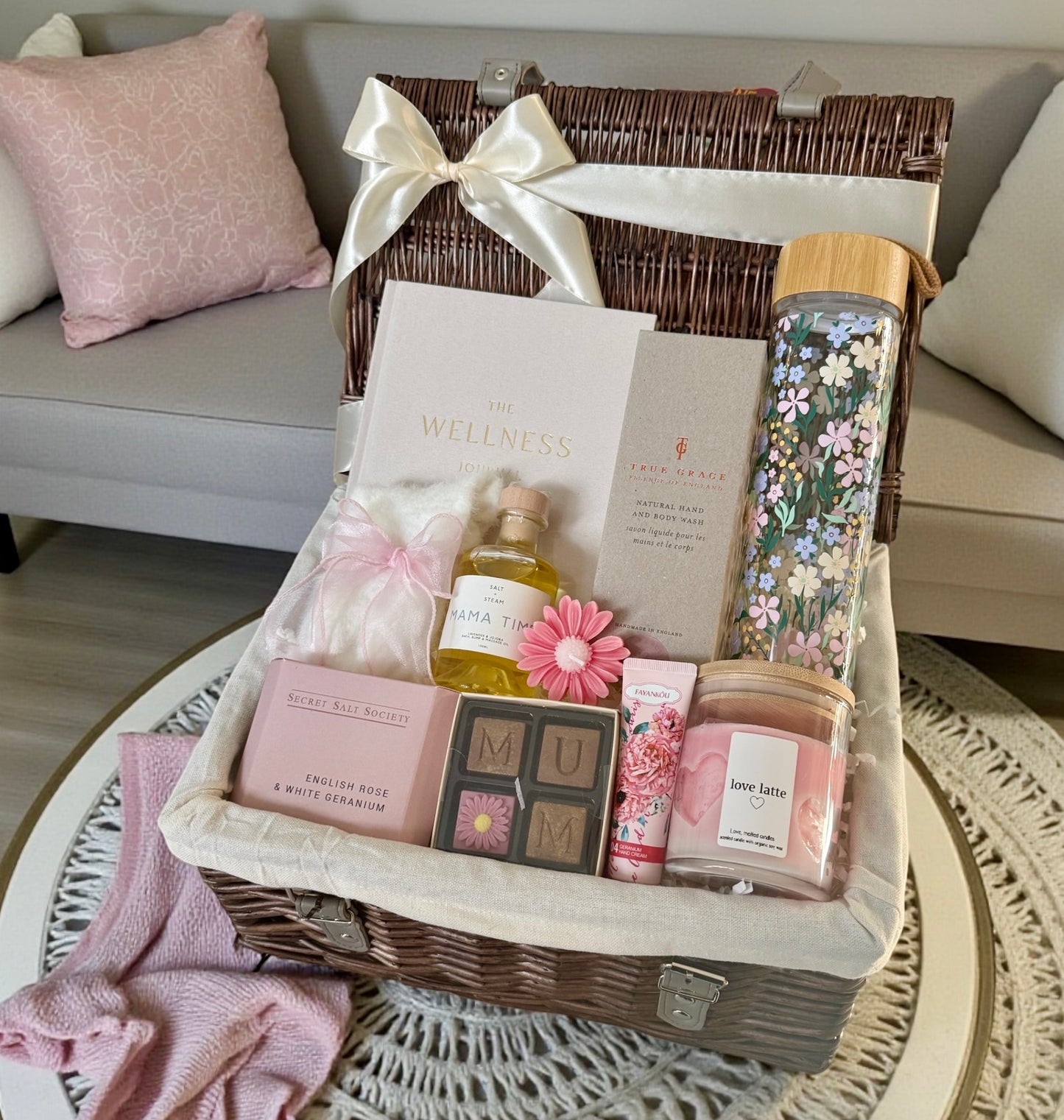 Mother’s Day luxury hamper with self-care items, wellness treats and soft pink accents, beautifully presented for Mum
