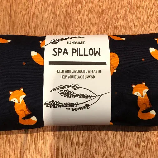 Foxes heatable lavender and wheat spa pillow with orange fox design.