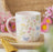 Luna Bloom Floral Print Mug with Pink Handle