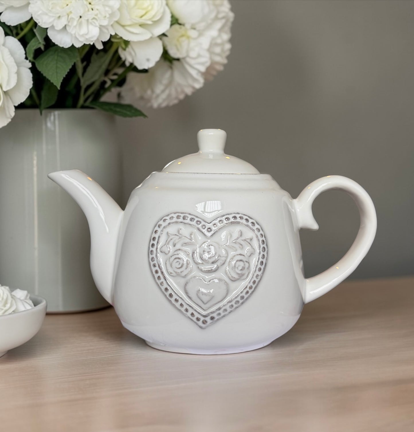 White Ceramic Teapot with Floral
Heart Detail