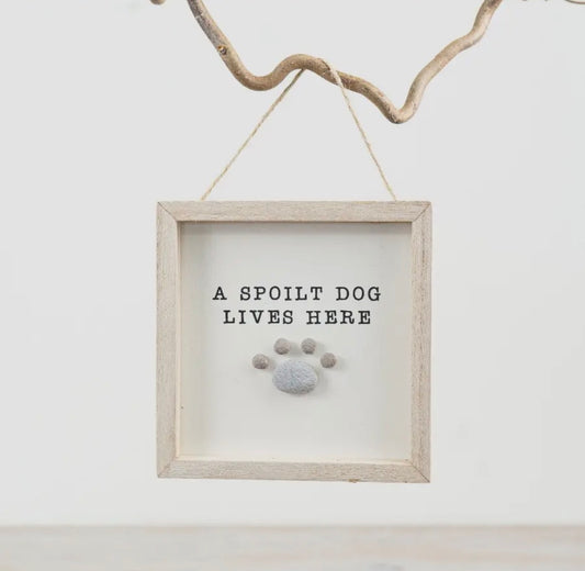 A Spoilt Dog Lives Here Pebble Sign