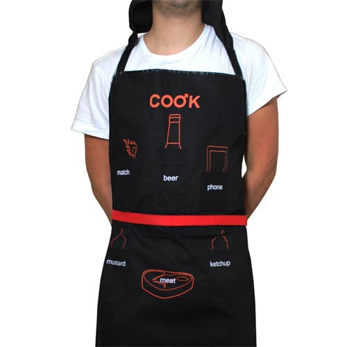 Male BBQ apron with bottle opener, pockets, hood, and BBQ tool rail for grilling convenience.