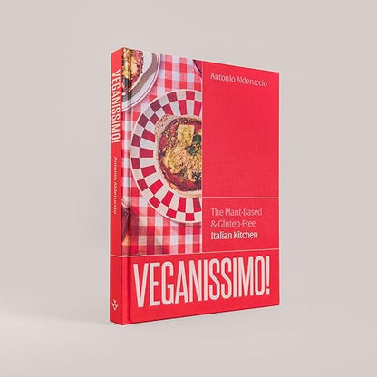 Book titled 'Veganissimo!' with a red cover featuring images of Italian dishes.