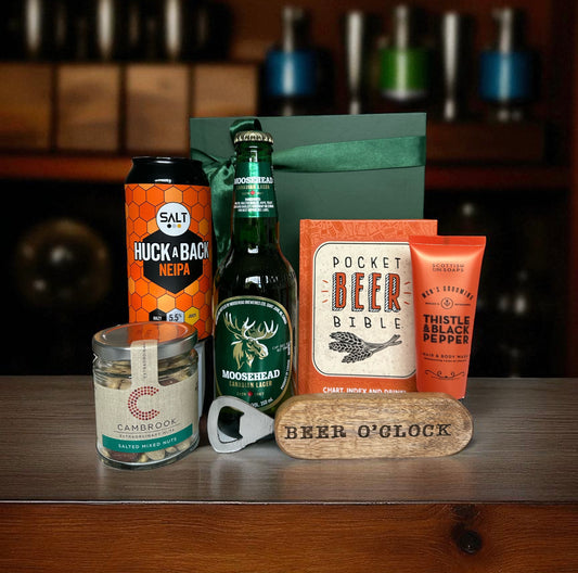 Gentleman’s Beer Gift Set featuring Moosehead Lager, Huck a Back NEIPA, pocket Beer Bible, “Beer O’Clock” opener, mixed salted nuts, and Thistle & Black Pepper wash.