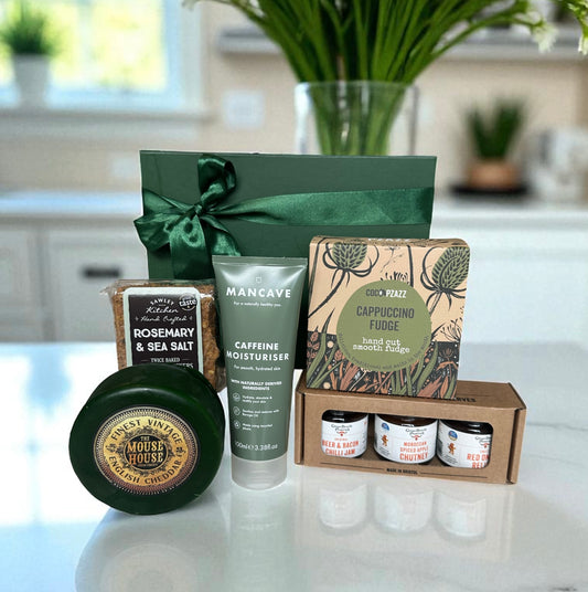 Gents Cheese and Pamper Set featuring vintage cheddar, rosemary & sea salt crackers, miniature preserves, cappuccino fudge, and Man Cave caffeine moisturiser.