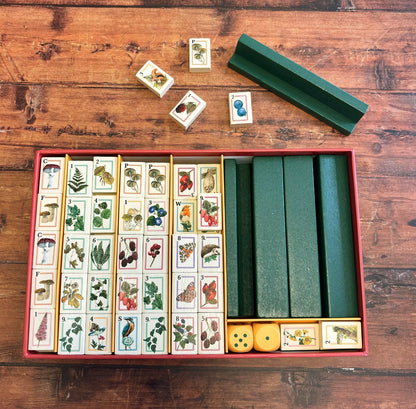 An illustrated woodland Mahjong set with 144 tiles, racks and dice. A beautiful gift for games nights, Mahjong fans, families and new players.