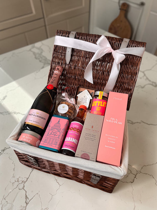 Luxe New Home celebrations with a stunning hamper including Moët Champagne, luxury reed diffuser, coffee, tea, biscuits and more. Perfect for housewarming.