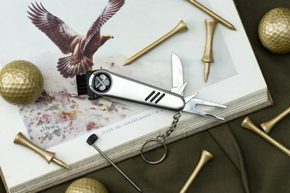 Compact multipurpose golf tool with knife and divot repair features, ideal for golf lovers.