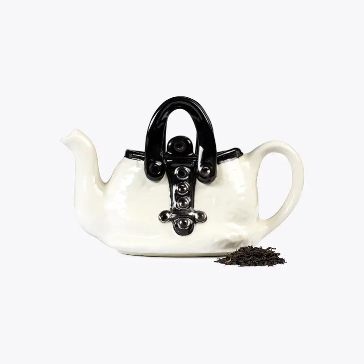 Handmade collectable full-size handbag designed teapot in white and black.