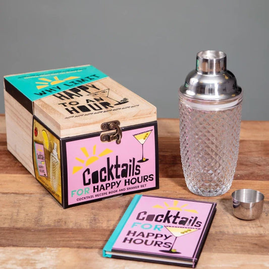Happy Hours Cocktail Set with recipe book, shaker, and jigger on a wooden table.