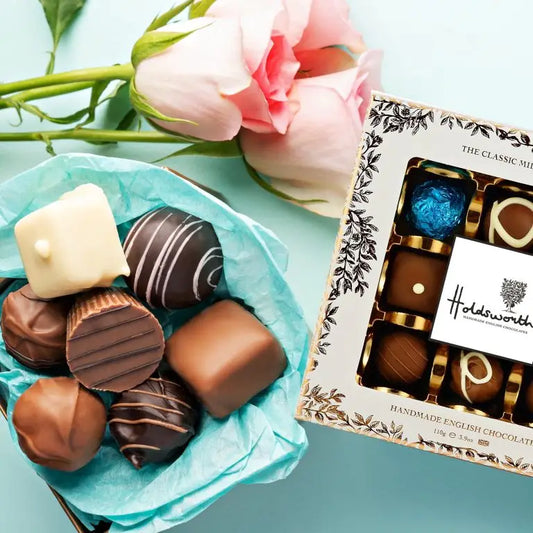 Holdsworth Chocolates Classic Milk Assortment in white foil-embossed gift box with milk chocolate truffles and pralines