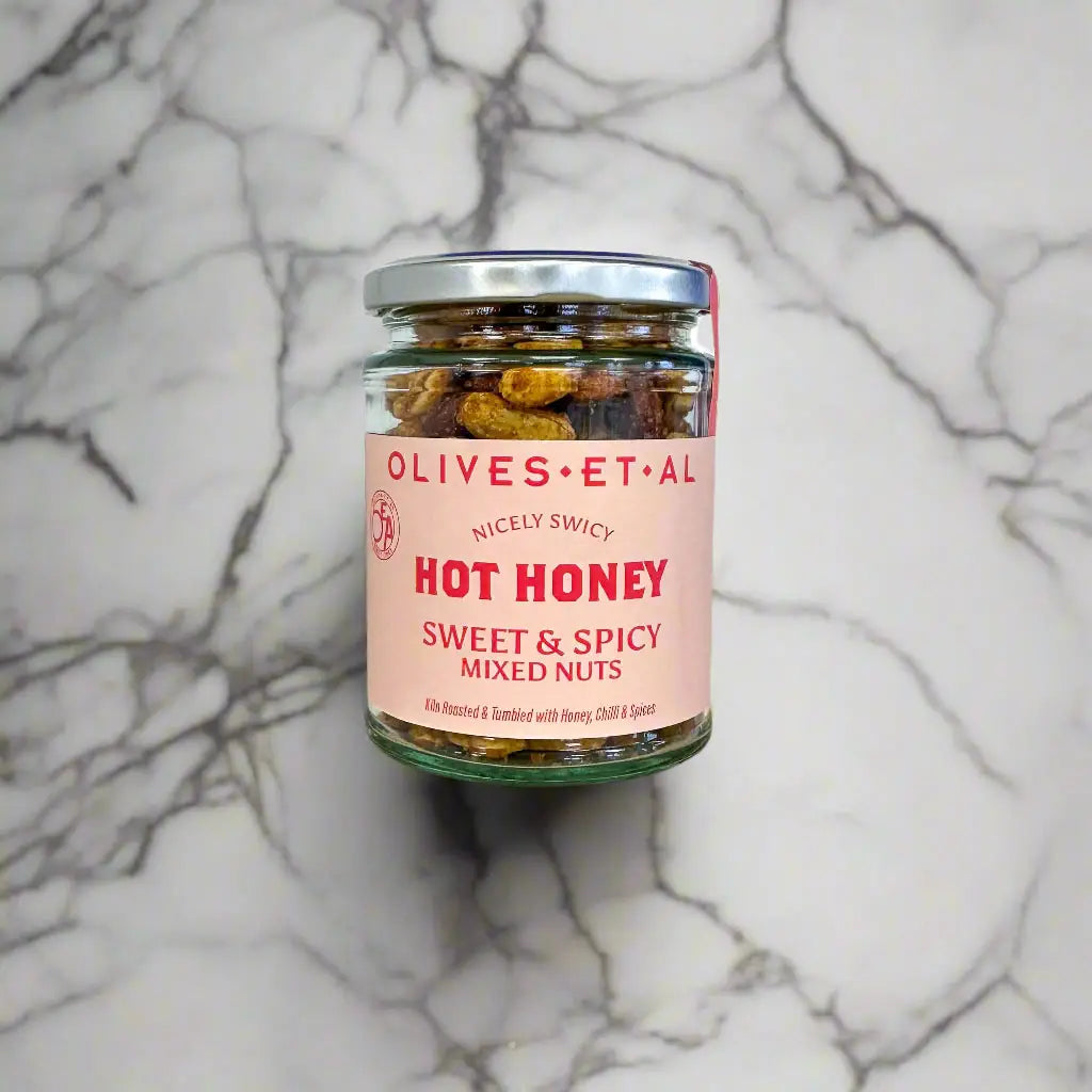 Crunchy roasted nuts coated in sweet honey and a spicy chilli kick. Bold, addictive, and perfect for snacking, sharing, or adding to grazing boards.