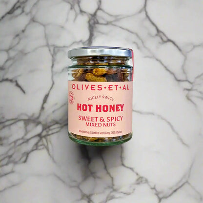 Crunchy roasted nuts coated in sweet honey and a spicy chilli kick. Bold, addictive, and perfect for snacking, sharing, or adding to grazing boards.