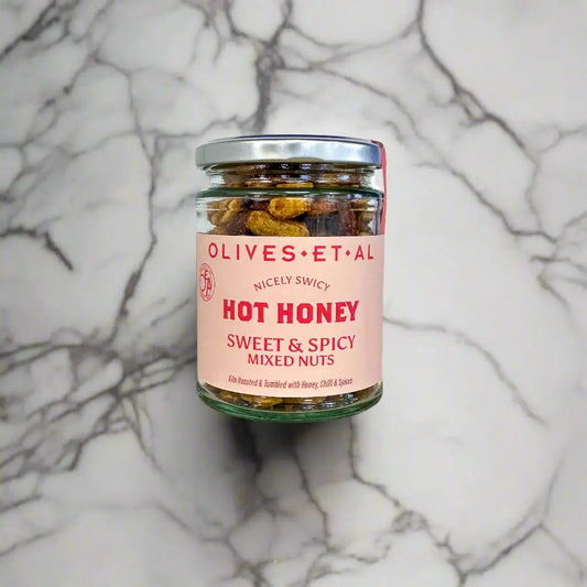 Crunchy roasted nuts coated in sweet honey and a spicy chilli kick. Bold, addictive, and perfect for snacking, sharing, or adding to grazing boards.