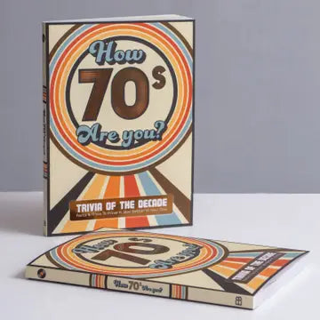 70s Are You Trivia Book with retro cover design and vibrant colors.