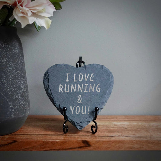 Heart-shaped slate coaster etched with “I Love Running.” Perfect gift for passionate runners!