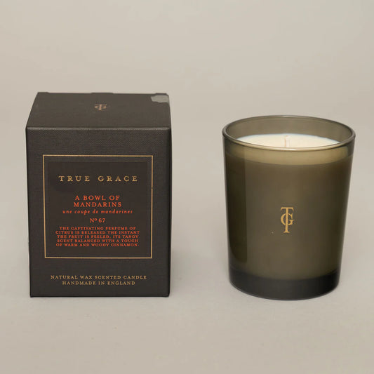 A bowl of mandarins luxury true grace candle 40 hours burn time 