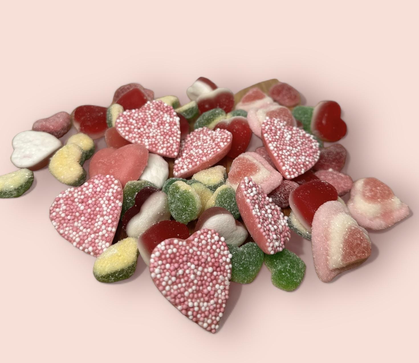 Heart-shaped chocolate and sweet mix, 60g collection by Top Hampers.