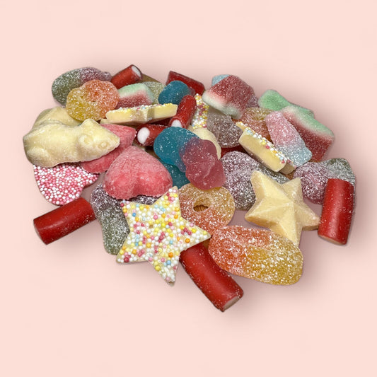 Assorted chocolates and sweets from TH Mixed Chocolate & Sweets Bag (60g).
