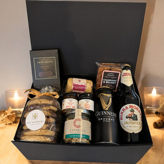 Gents Treat Box with craft beers, cookies, and snack assortment.